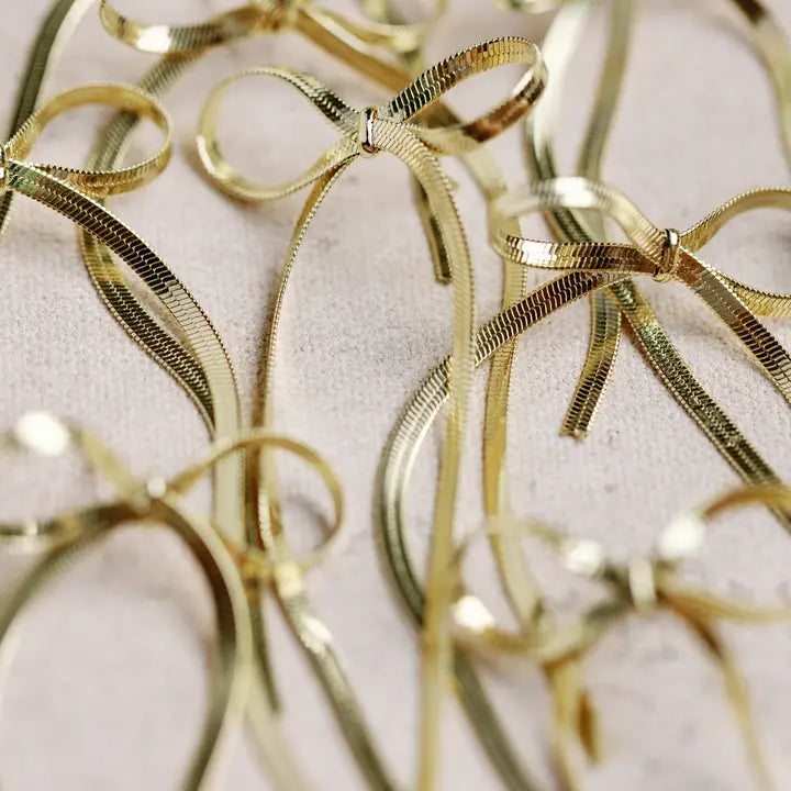 Maxi Gold Duster Bow Earrings
